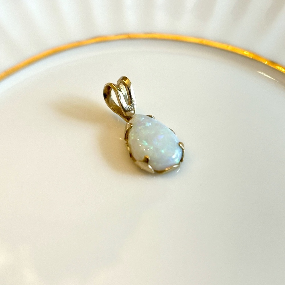 Elegant Gold and White Opal Pendant